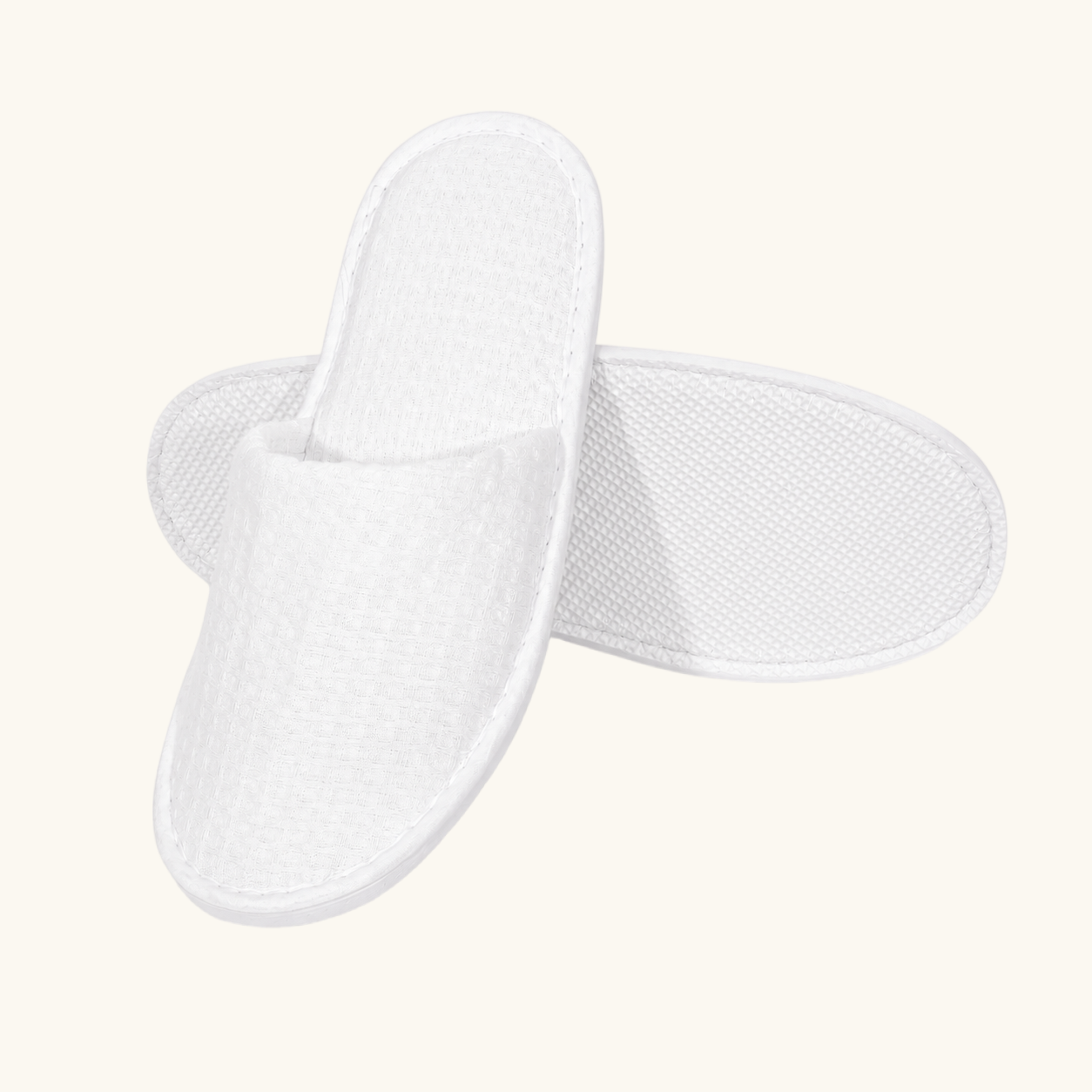 Bulk waffle hotel slippers with embroidered logo